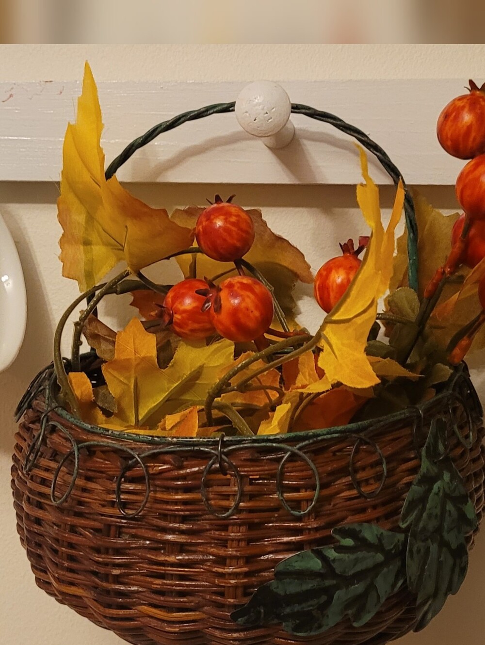 Woven Hanging Basket with Wire Metal Leaves.
